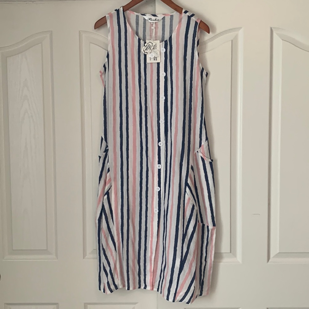 NWT, unique dress or tunic with side pockets and buttons off center. Size S.